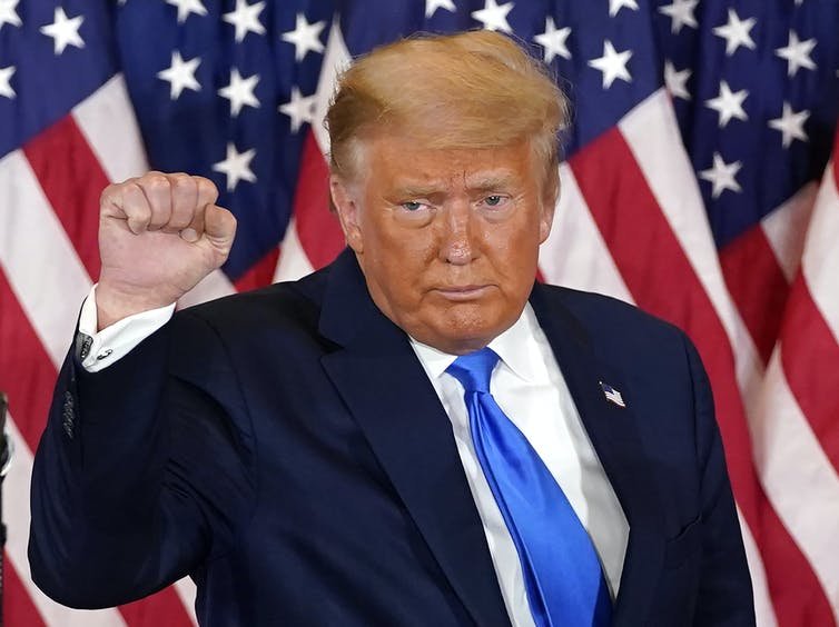 Re-election hopes fading, Trump tries for an election win in the courts