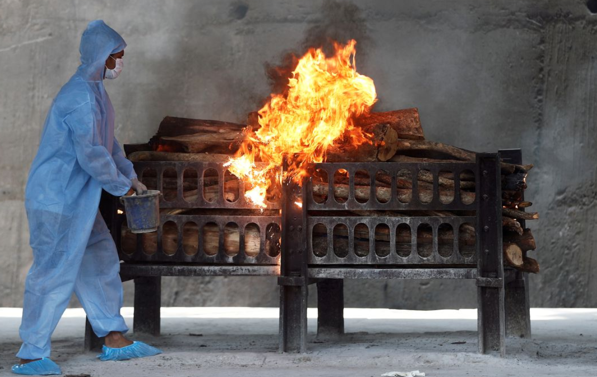 'Each burning pyre is an unspeakable, screeching horror' – one researcher on the frontline of India's COVID crisis