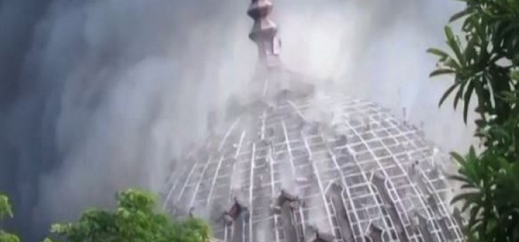 Giant dome collapses as fire engulfs mosque in Indonesia
